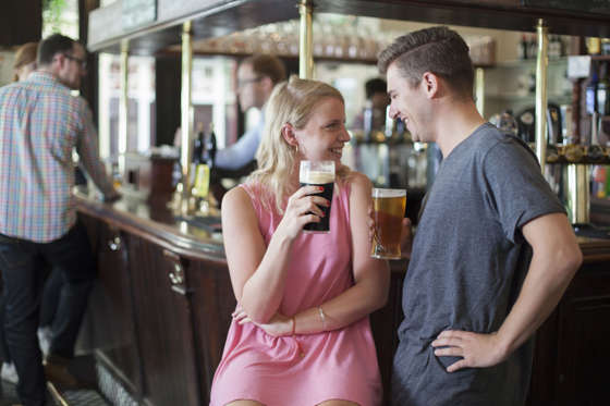 man and woman in a pub
