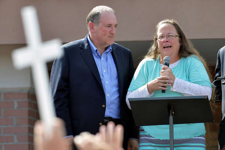 Rowan County Clerk Kim Davis, with Republican presidential candidate Mike Huckabee, left, at her side, speaks after being released from the Carter County Detention Center, Tuesday, Sept. 8, 2015, in Grayson, Ky.