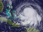 In this handout from the National Oceanic and Atmospheric Administration (NOAA), Hurricane Joaquin is seen churning in the Caribbean September 30, 2015.