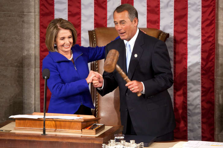 House Speaker John Boehner, right, shakes hands as he receives the gavel from House Minority Leader Nancy Pelosi, as the 112th Congress convenes in Washington, D.C., U.S., on Wednesday, Jan. 4, 2010.