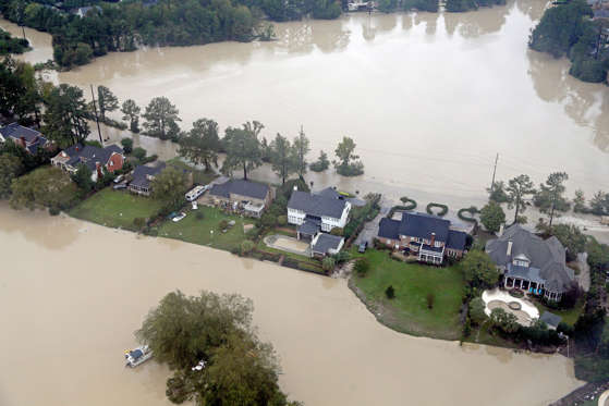 Floodwaters close in on homes on Oct. 5, 2015, on Lake Katherine in Columbia, S.C.