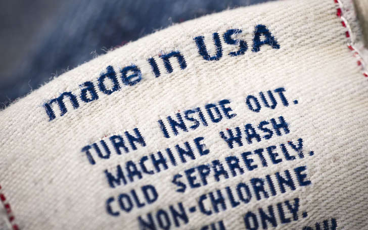 Cotton denim jean material with Made in USA label. iStockphoto/Getty Images