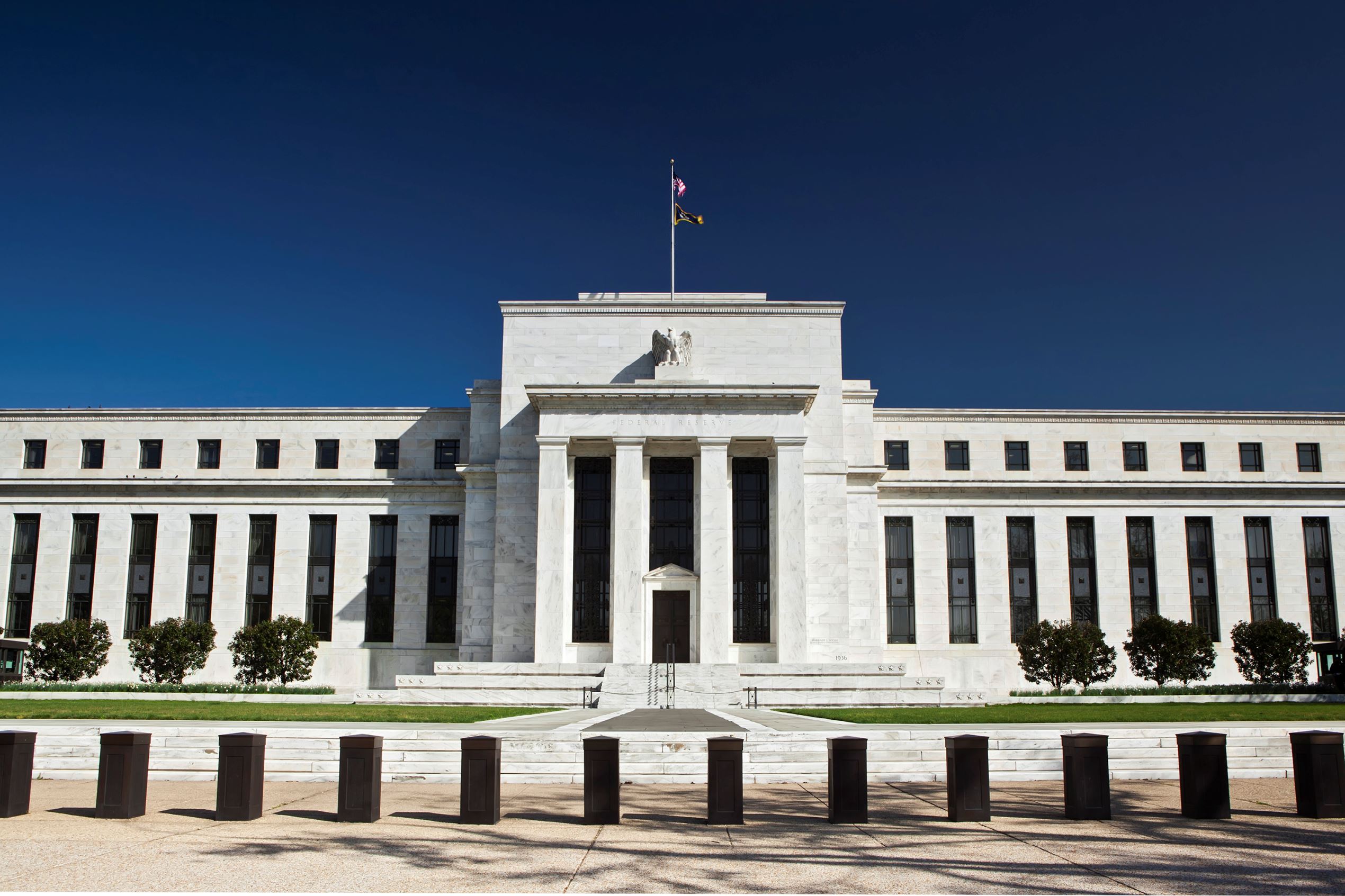 U.S. holds rates steady, expects