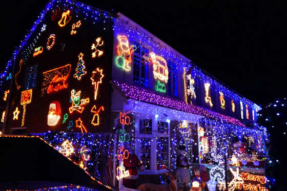 Christmas lights decorate homes on Byron Road, New Milton, Britain - 01 Dec 2015 Families in Byron Road light up their homes with over the top Christmas decorations and lights for charity