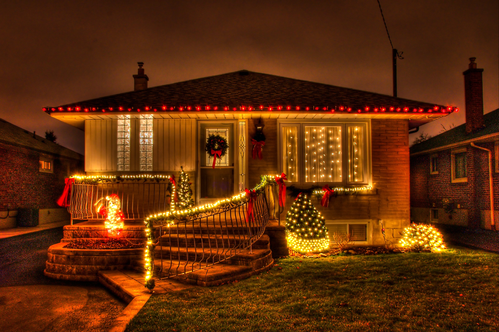 TORONTO, ONTARIO, CANADA - 2011/12/19: House decorated for Christmas at night, Nativity season celebrations in December. (Photo by Roberto Machado Noa/LightRocket via Getty Images)