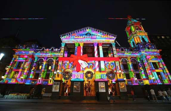 MELBOURNE, AUSTRALIA - DECEMBER 13: Melbourne Town Hall is illuminated with Christmas projections as Melbourne lights up for Christmas on December 13, 2012 in Melbourne, Australia. (Photo by Scott Barbour/Getty Images)