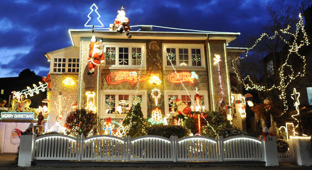 A colourfully decorated house is iluminated with Christmas lights in the evening hours in the northern German city of Hamburg on November 30, 2010. AFP PHOTO / FABIAN BIMMER (Photo credit should read FABIAN BIMMER/AFP/Getty Images)