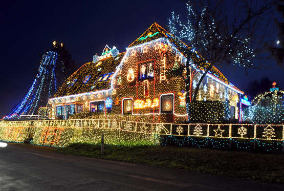 A house is illuminated with more than 400000 lights in Calle, central Germany, on November 26, 2014. The house's owner started 1999 decorating his house for advent season after being inspired during a travel to the US. AFP PHOTO / DPA/ INGO WAGNER GERMANY OUT (Photo credit should read INGO WAGNER/AFP/Getty Images)