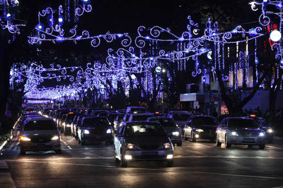 SINGAPORE - DECEMBER 24: Christmas lights and decorations are seen lit up along Orchard Road on December 24, 2011 in Singapore. (Photo by Lionel Ng/Getty Images)