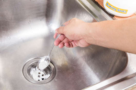 One of the worst things about cleaning the bathroom is dealing with gross drains. Those slimy hairballs? Shudder. Your plan of action: Pour one cup of baking soda into the drain, followed by one cup of hot vinegar. Finish up by pouring boiling water down the drain. No more showering with ankle-deep puddles at your feet.
