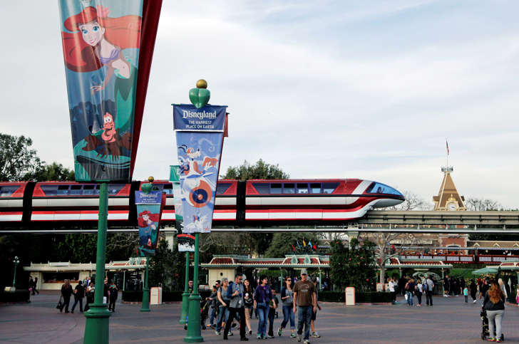 The Disneyland Monorail moves past the main entrance area of Disneyland, Thursday, Jan. 22, 2015, in Anaheim, Calif. A major measles outbreak traced to Disneyland has brought criticism down on the small but vocal movement among parents to opt out of vaccinations for their children. (AP Photo/Jae C. Hong)