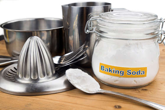 You don't want those surfaces to lose their luster. To keep them bright, you'll need an alumnium pan (or a pan lined with aluminum foil), boiling water, and (you guessed it!) baking soda. Place the tarnished silver or steel in the pan, then pour in the boiling water and baking soda—use a quarter cup for every four cups of boiling water. It'll start bubbling, and after a few minutes, most silver and steel will look good as new.