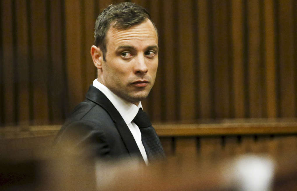 <span style="font-size:13px;">Oscar Pistorius sits in the dock at the North Gauteng High Court in Pretoria, South Africa, for a bail hearing.</span>