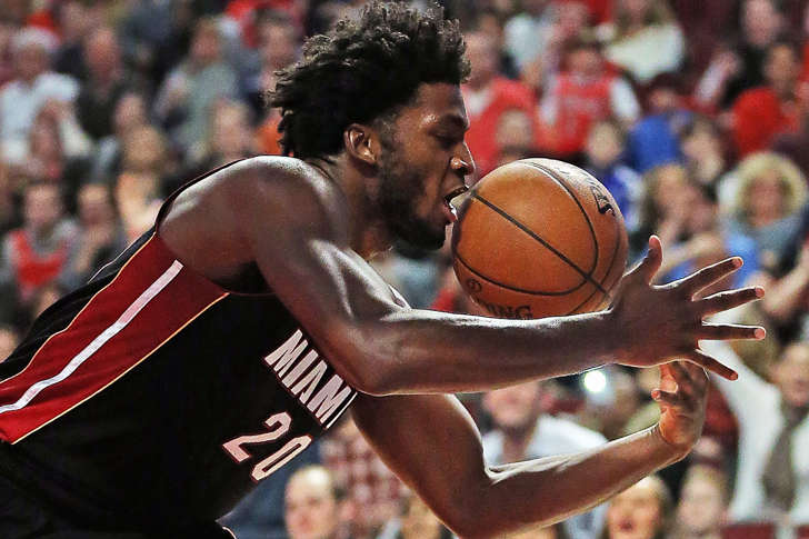 Justise Winslow (20) of the Miami Heat grabs a rebound against the Chicago Bulls at the United Center on March 11, in Chicago, Illinois. The Heat defeated the Bulls 118-96.