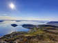 Hammerfest and Rypefjord on a clear summer day. The sun is shining from a blue sky. The picture is taken from the mountaintop called "Tyven".
Ole-Gunnar Rasmussen