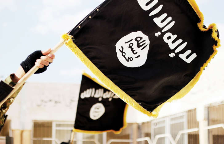 Islamic State of Iraq and the Levant propaganda photo showing the Black Muhammad Standard banner symbol of ISIS.