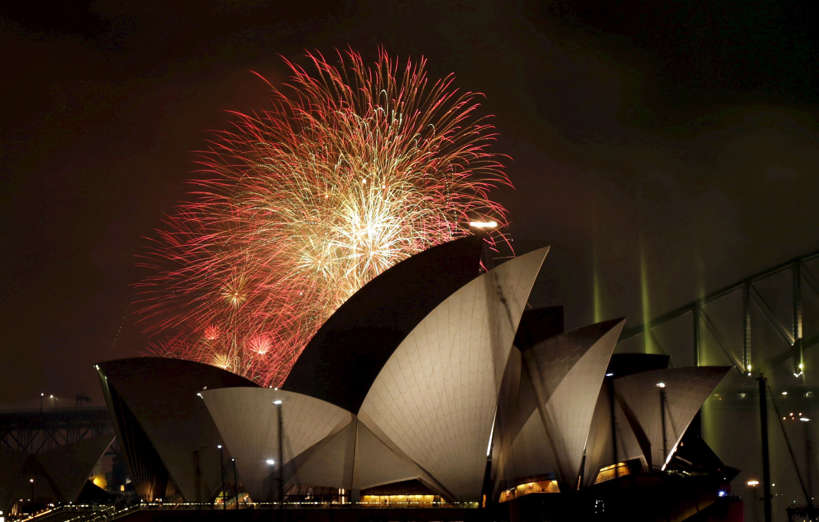 Fireworks explode over the Sydney Opera House and Harbour Bridge as Australia's largest city ushers in the New Year, January 1, 2016.