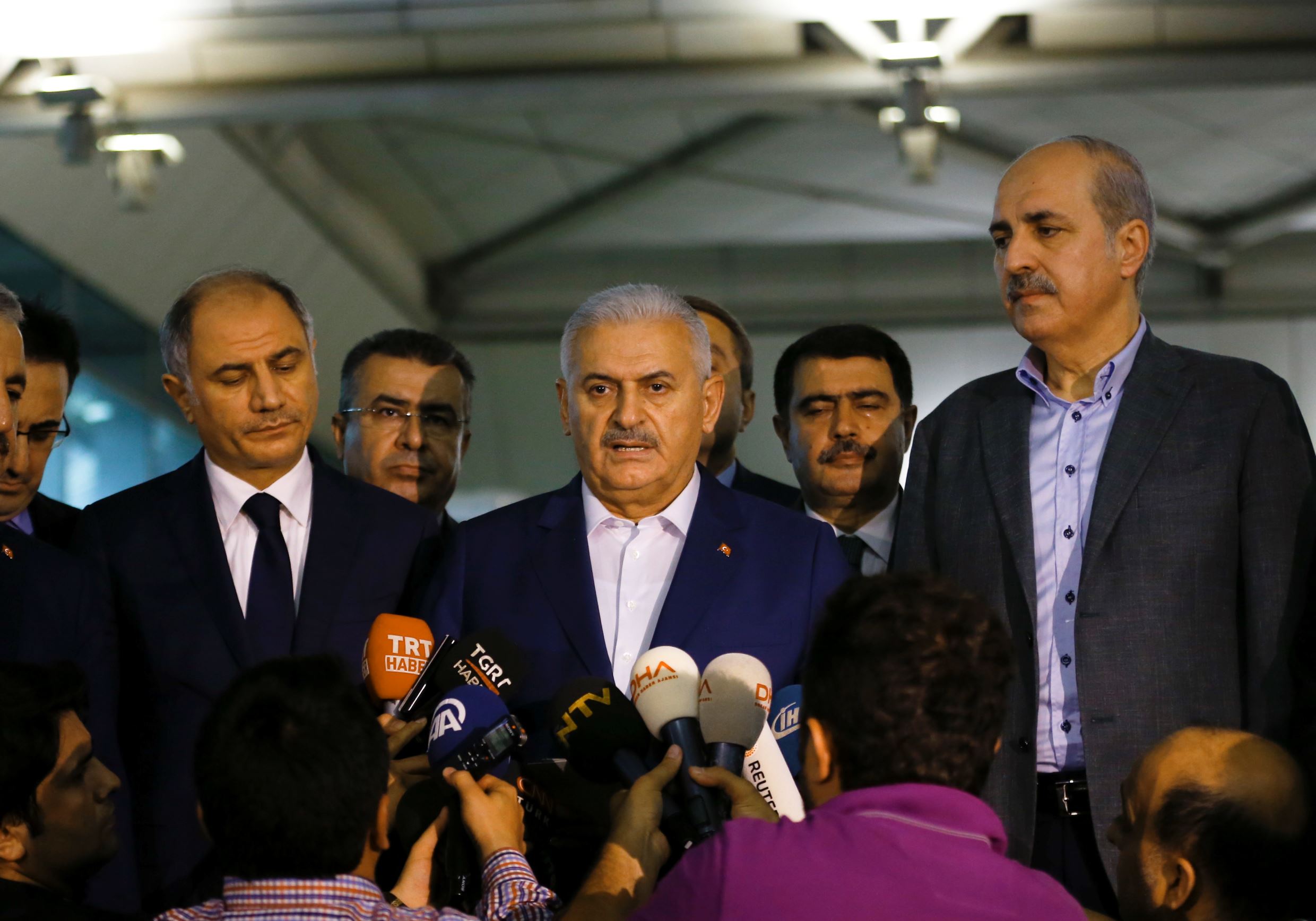 Turkey's Prime Minister Binali Yildirim speaks to the press at the Ataturk airport in Istanbul, Turkey, following a multiple suicide bombing, June 29, 2016. . REUTERS/Murad