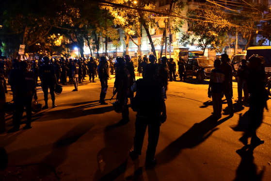 Bangladeshi security personnel stand guard outside a restaurant during an attack in Dhaka's high-security diplomatic district early on July 2, 2016. Gunmen stormed a crowded restaurant popular with foreigners in the Bangladeshi capital on July 1 night, a