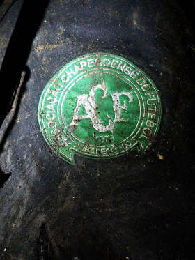 Plane carrying Brazilian football team Chapecoense crashes in Colombia - 29 Nov 2016 Logo of Brazilian football team Chapecoense at the site of the plane crash in a mountainous area outside the Colombian city of Medellin