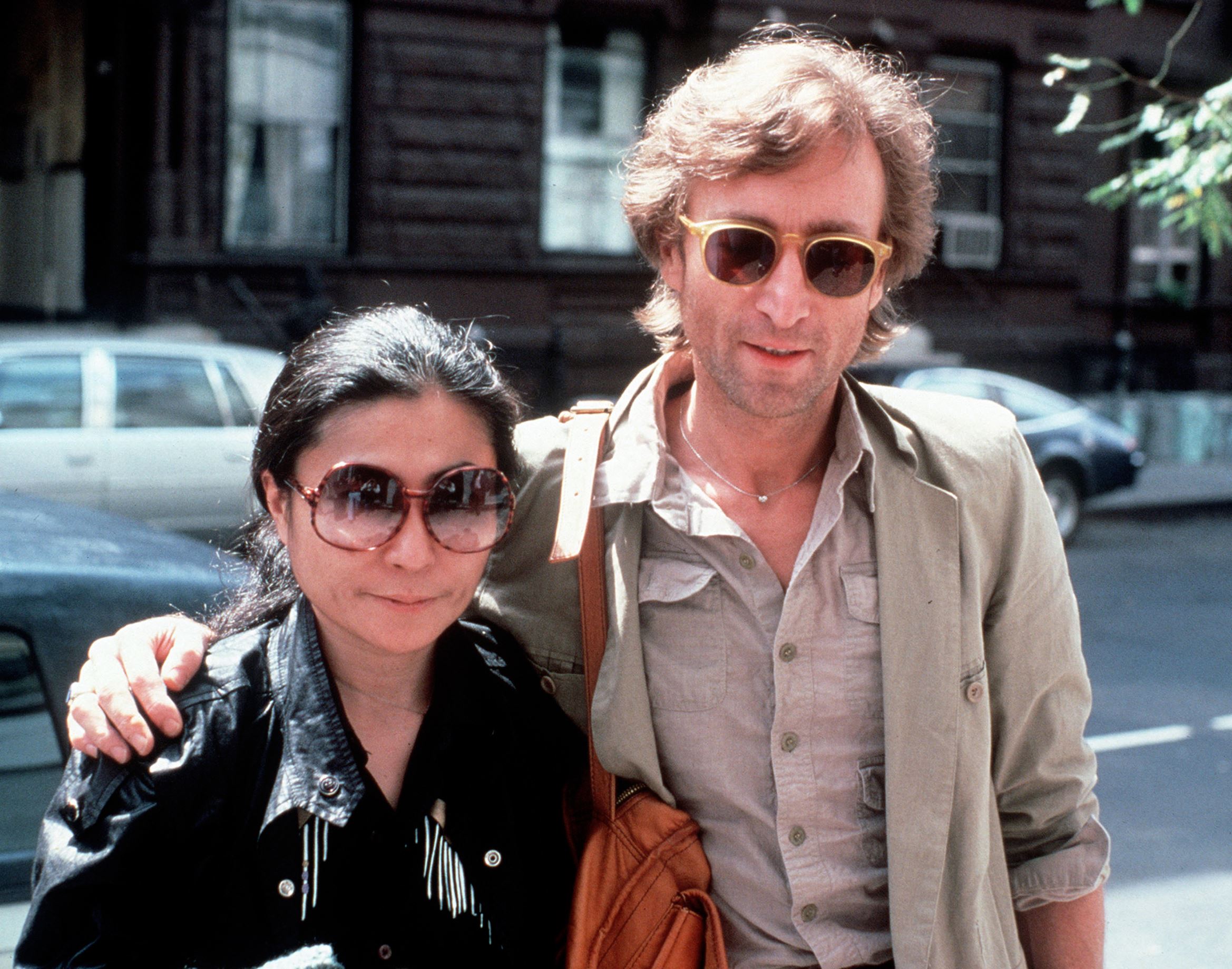 n this Aug. 22, 1980, file photo, John Lennon, right, and his wife, Yoko Ono, arrive at The Hit Factory, a recording studio in New York City. The death of Lennon, shot in 1980 still reverberates as a defining moment for a generation and for the music world.