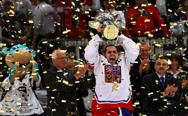 COLOGNE, GERMANY - MAY 23:  Tomas Rolinek (C) of Czech Republic celebrates after winning the IIHF World Championship gold medal match between Russia and Czech Republic at Lanxess Arena on May 23, 2010 in Cologne, Germany.  (Photo by Martin Rose/Bongarts/