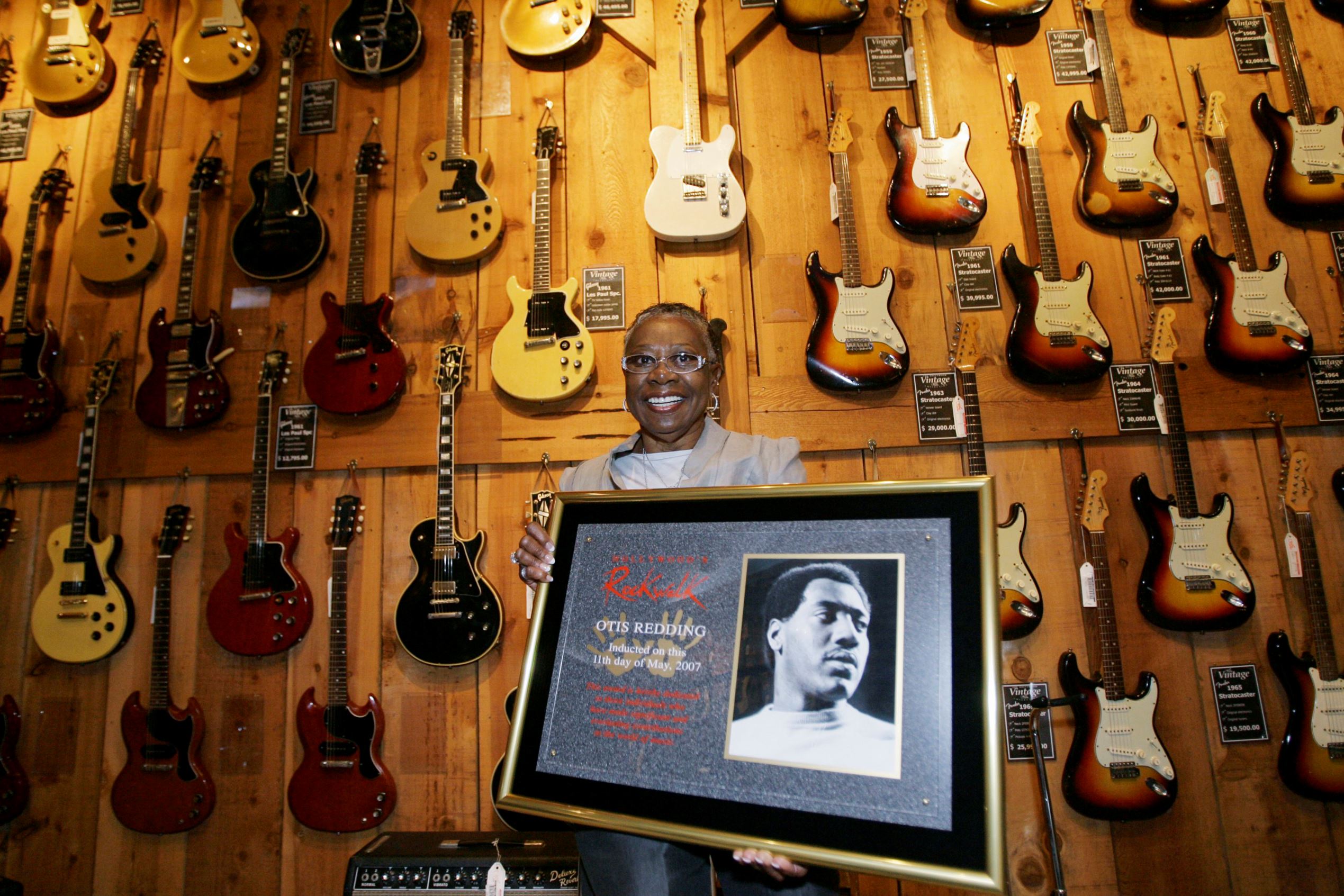 R&amp;B Singer Otis Redding's widow and former manager, Zelma Redding, poses with a plaque of the late singer, after Otis Redding was inducted into Hollywood's RockWalk, Friday, May 11, 2007, as part of a series of events celebrating the 40th anniversary of the Monterey International Pop Festival, at the Hollywood Guitar Center in Los Angeles.
