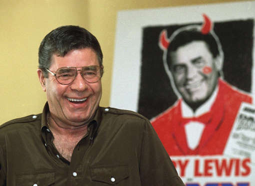 Entertainer Jerry Lewis laughs as he fields questions from the media at the Ritz-Carlton Hotel in Pasadena, Calif., Nov. 28, 1995. Lewis is starring in the nationally touring production of the Broadway musical ?Damn Yankees,? which comes to the Pasadena Civic Auditorium for eight performances starting on November 28.