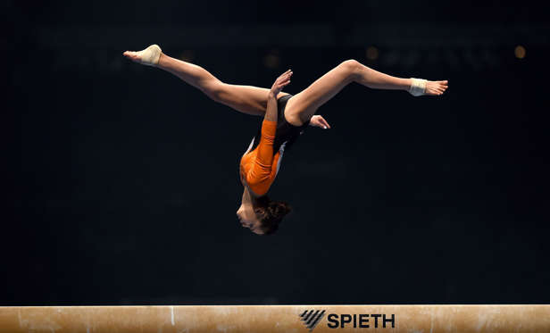 KARLSRUHE, GERMANY - DECEMBER 05:  Isabelle Stingl of TG Karlsruhe Soellingen competes on the Beam during the Women's DTL Finals 2015 at Messehalle 2 on December 5, 2015 in Karlsruhe, Germany.  (Photo by Matthias Hangst/Bongarts/Getty Images)