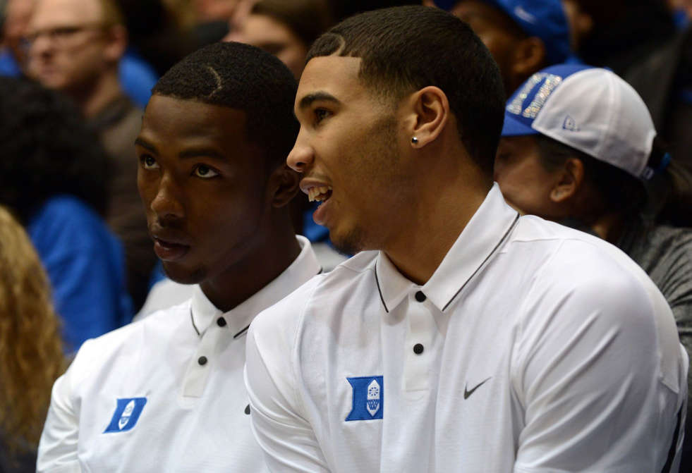 Nov 11, 2016; Durham, NC, USA; Injured Duke Blue Devils forward Harry Giles (left) and forward Jayson Tatum talk on the bench during the second half against the Marist Red Foxes at Cameron Indoor Stadium. Duke won 94-49.