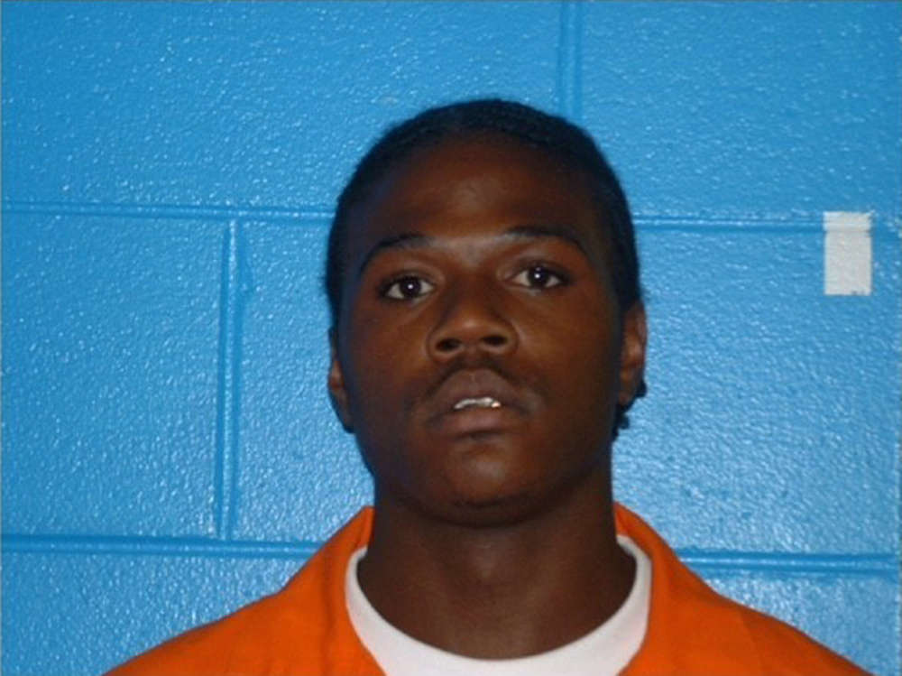 This undated photo released by the Americus Police Department shows Minguell Kennedy. Georgia authorities say they are looking for Kennedy, who they believe is armed and dangerous, in connection with the fatal shooting of one police officer and the wounding of another.