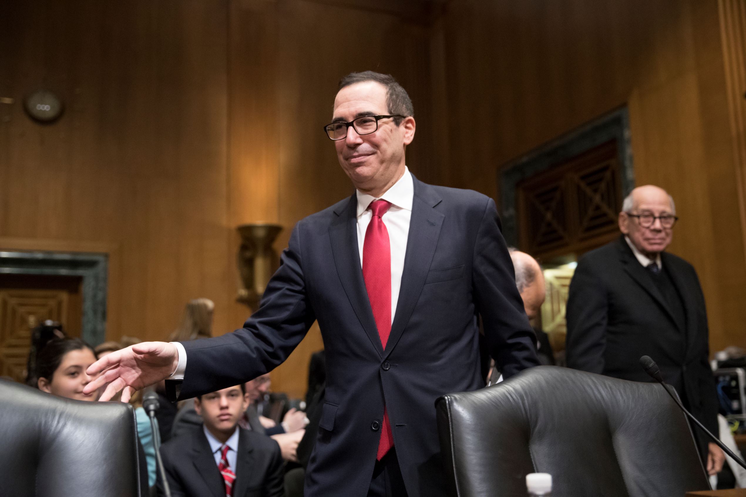 Treasury Secretary-designate Steven Mnuchin arrives on Capitol Hill in Washingto...