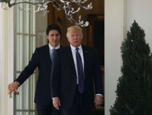 Slide 3 of 19: U.S. President Donald Trump walks with Canadian Prime Minister Justin Trudeau after a meeting at the White House on Feb. 13, 2017 in Washington, D.C.