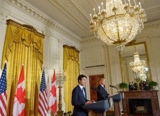 Slide 1 of 19: Donald Trump and Justin Trudeau hold a joint press conference in the East Room of the White House in Washington, following their meetings  
Feb. 13, 2017.