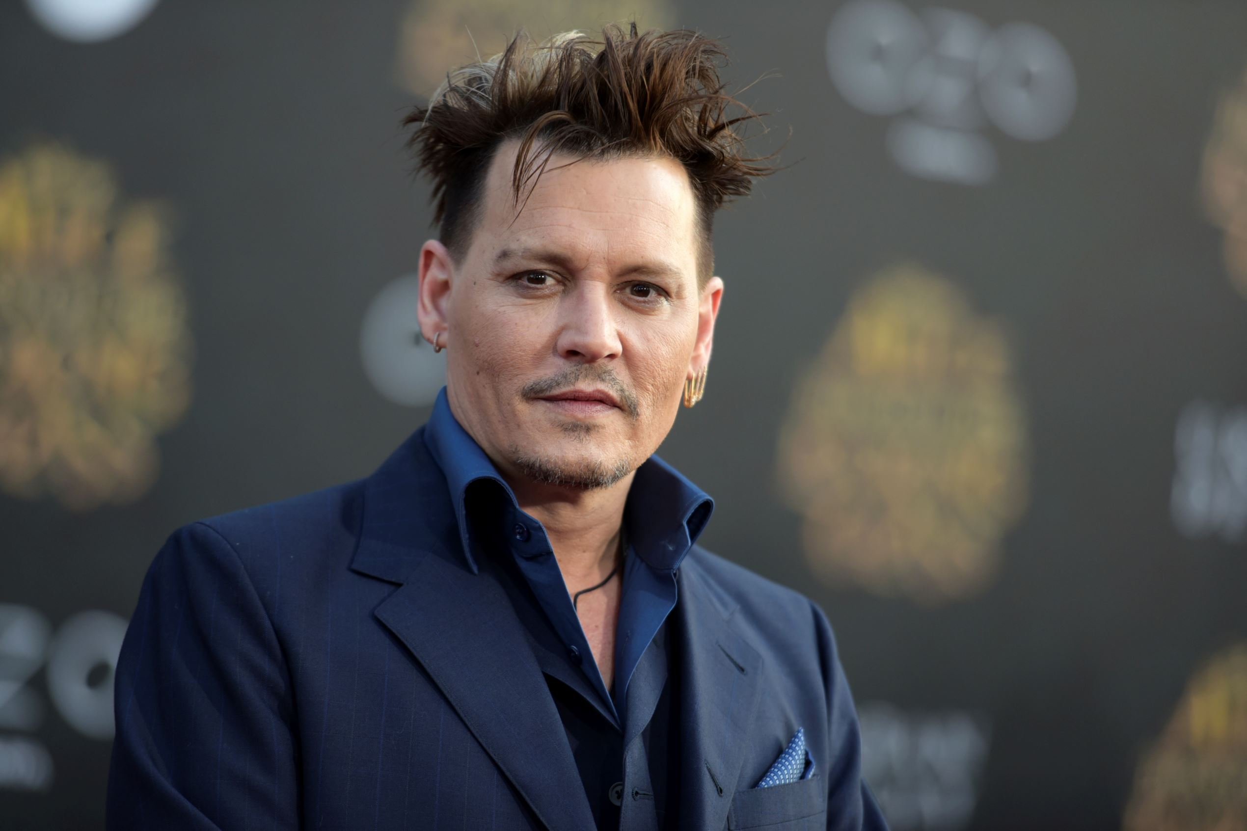 Depp's managers claim lied about