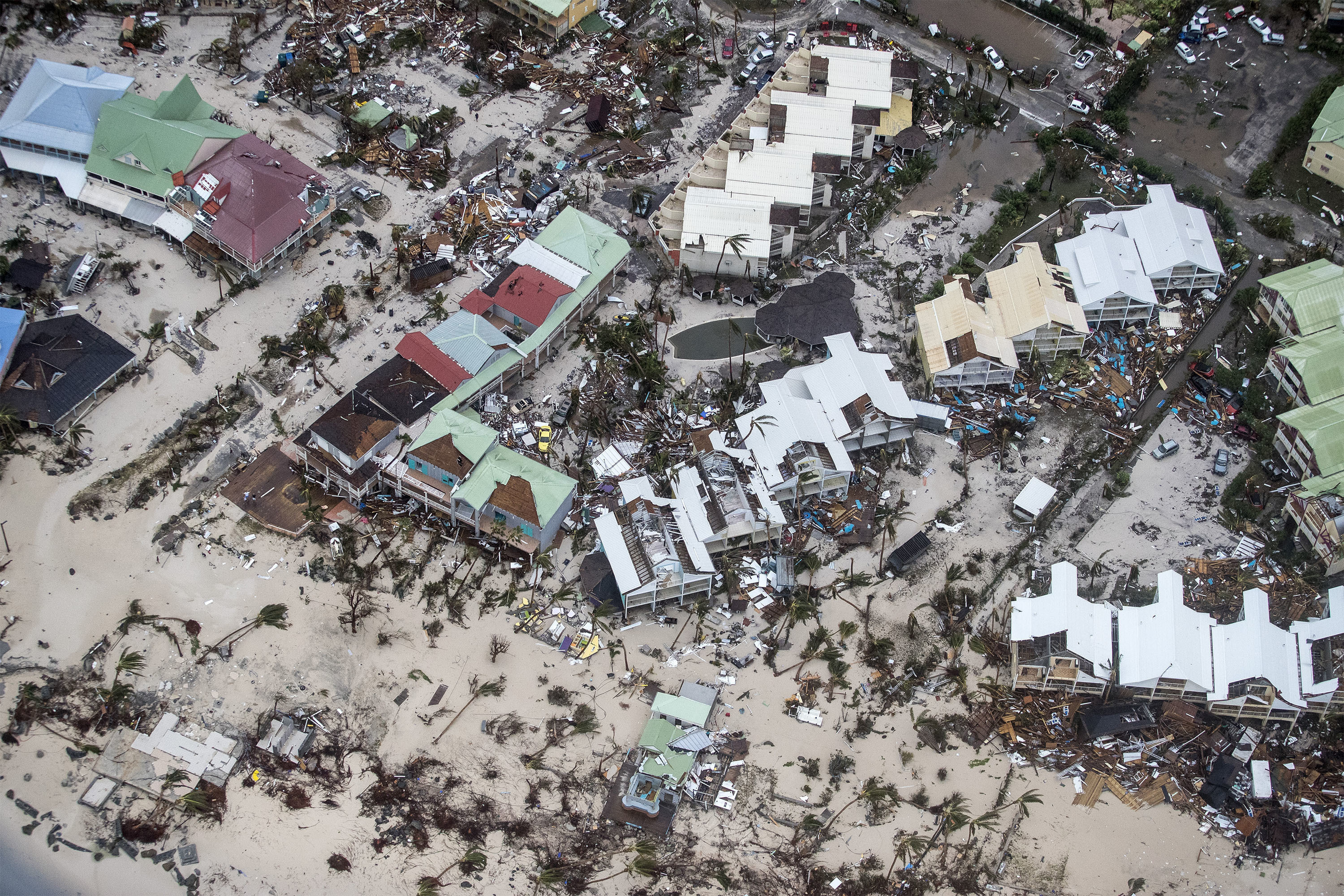 This Sept. 6, 2017 photo provided by the Dutch Defense Ministry shows storm damage in the aftermath of Hurricane Irma, in St. Maarten. Irma cut a path of devastation across the northern Caribbean, leaving thousands homeless after destroying buildings and uprooting trees. Significant damage was reported on the island that is split between French and Dutch control.