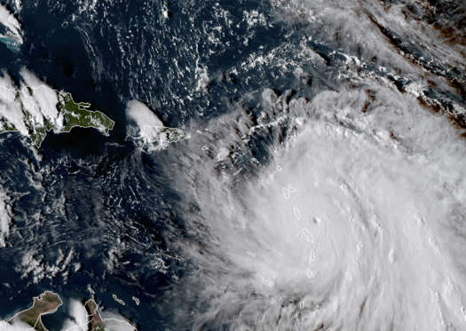 Slide 2 of 20: This Monday, Sept. 18, 2017, GOES East satellite image provided by NASA taken at 20:30 UTC, shows the eye of Hurricane Maria as it nears Dominica. The National Hurricane Center in Miami said Monday evening that Air Force Reserve hurricane hunter planes found that Maria had strengthened into a storm with 160 mph (260 kph) winds.