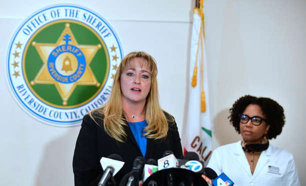 Slide 1 of 12: Susan von Zabern (L), Director of Department of Public Services speaks as Dr. Sophia Grant (R), Medical Director of Child Abuse and Neglect at Riverside University Health System, looks on during a press conference in Perris, California on January 16, 2018, where authorities rescued 13 malnourished children held captive by their parents.