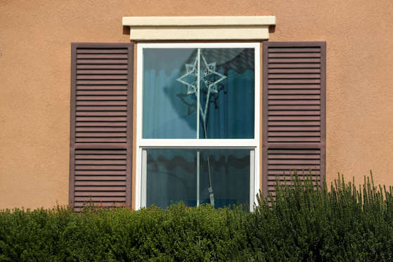 Slide 4 of 12: A decoration hangs in the window of the home of David Allen and Louise Anna Turpin in Perris, California, U.S., January 16, 2018.