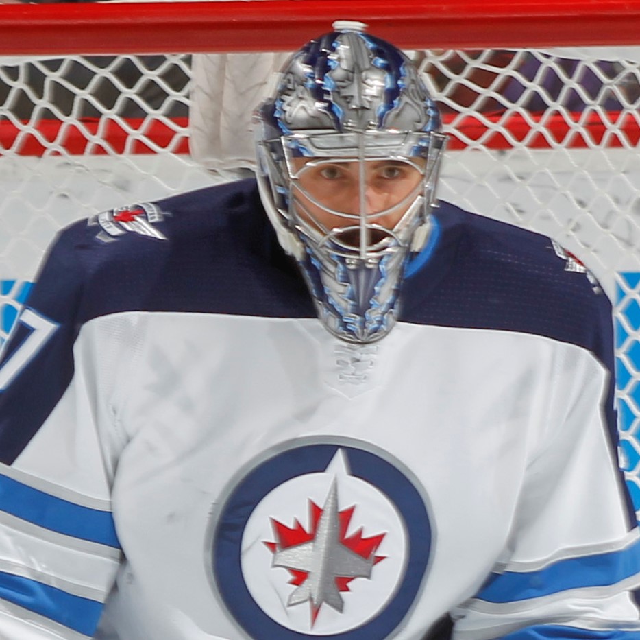 Hellebuyck with shutout Jets beat