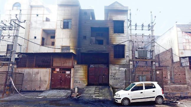 Delhi fire: Drunk guard, locked