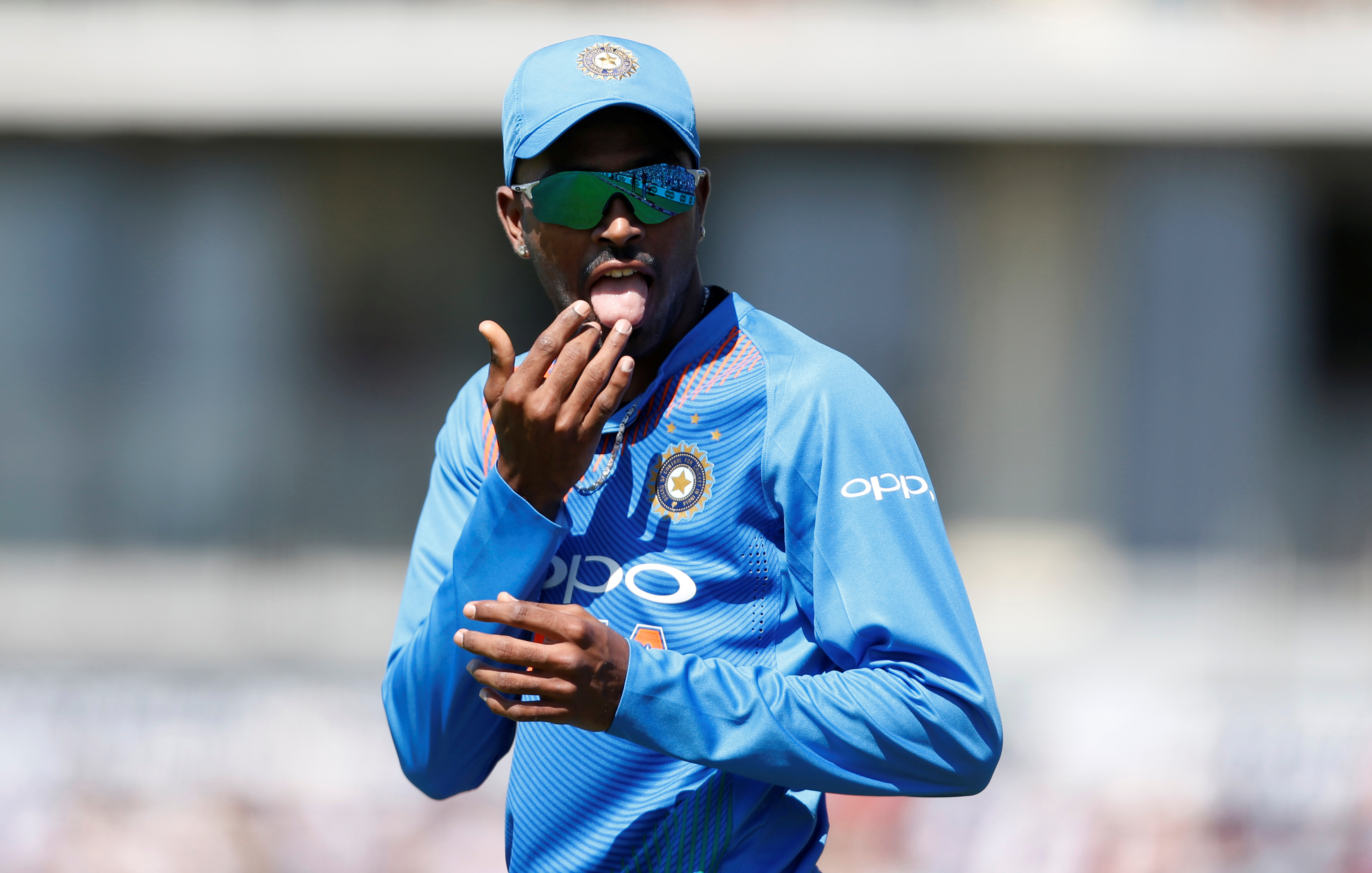 Pandya 4/38, Rohit's 100*