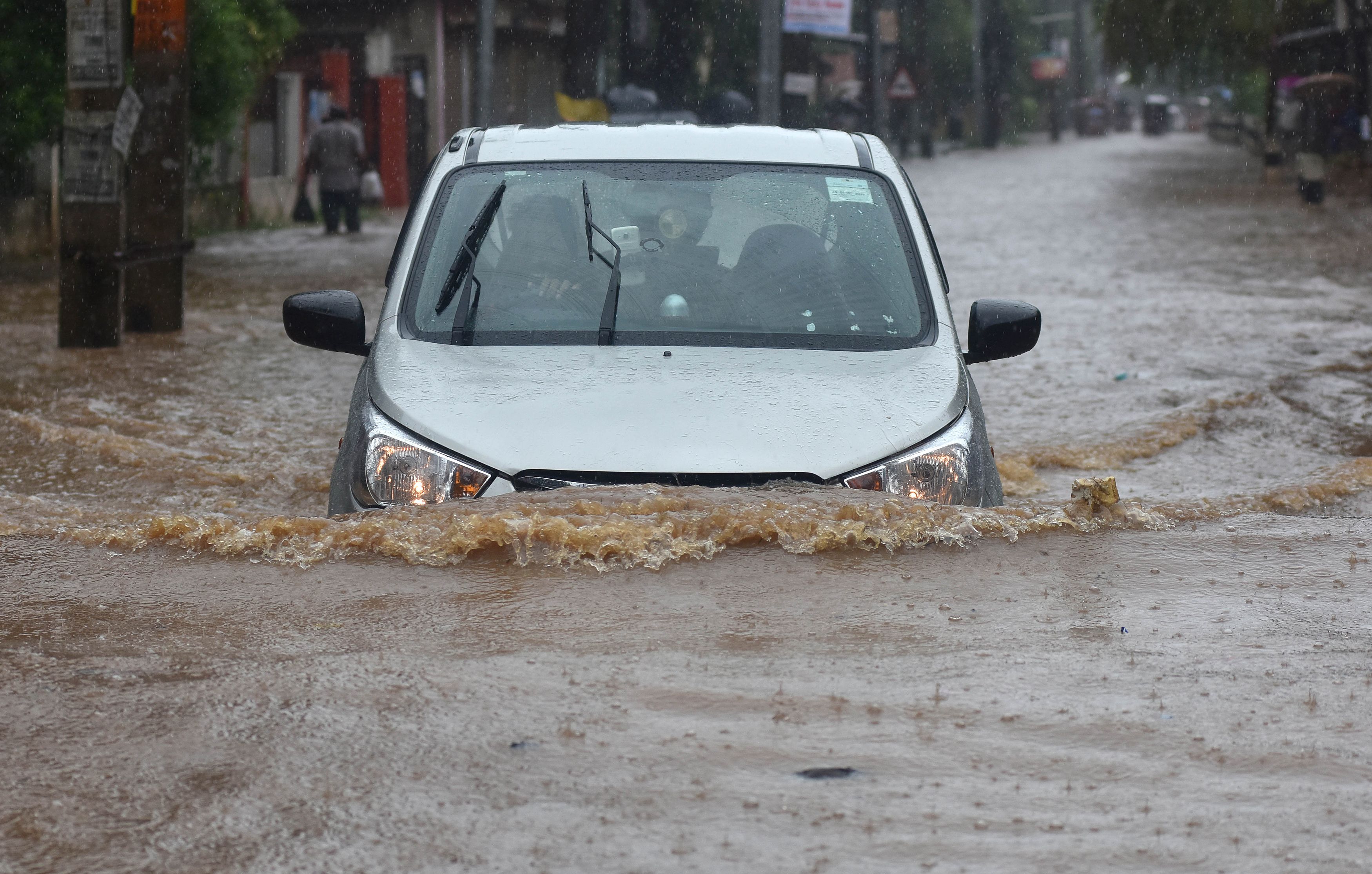 Cars submerged water after heavy