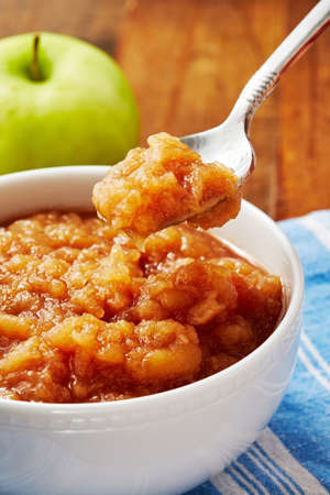 a close up of a bowl of food on a plate: Instant Pot Applesauce - Delish.com
