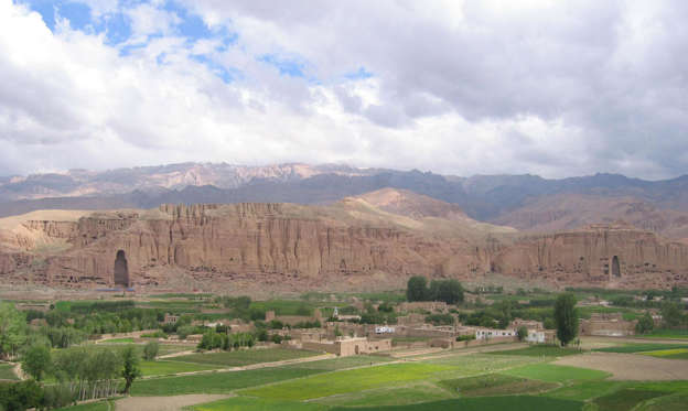 Slide 2 of 54: The archaeological remains of the Bamiyan Valley – containing fortified buildings from the Islamic period as well as Buddhist monastic sanctuaries – are one of Afghanistan's most significant sites. However, the area has been shaken by political unrest and terrorism; in 2001 the two standing Buddha statues – formerly the largest standing Buddha carvings in the world – were destroyed by the Taliban.