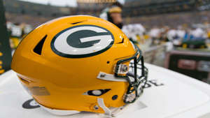a close up of a helmet: Aug 16, 2018; Green Bay, WI, USA; A Green Bay Packers helmet sits on the sidelines prior to the game against the Pittsburgh Steelers at Lambeau Field.