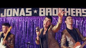 Joe Jonas et al. posing for the camera: Official music video by Jonas Brothers performing "What A Man Gotta Do" - available everywhere now: https://JonasBrothers.lnk.to/WAMGDYD

►Subscribe for more official content from Jonas Brothers: https://JonasBrothers.lnk.to/SubcribeYD 

►Exclusive Merch: https://shop.jonasbrothers.com/ 

►Follow Jonas Brothers Online
Instagram: https://www.instagram.com/jonasbrothers/ 
Facebook: https://www.facebook.com/JonasBrothers/ 
Twitter: https://twitter.com/jonasbrothers 
Website: https://jonasbrothers.com/ 

Video directed by Joseph Kahn
Video produced by Charleen Manca
for Supply & Demand

►"What A Man Gotta Do" Lyrics:

Cut my heart about one, two times
Don't need to question the reason, I'm yours, I'm yours
I know the other lose a fight just to see you smile
'Cause you got no flaws, no flaws

I'm not tryin' to be your part-time lover
Sign me up for the full-time, I'm yours, all yours

So, what a man gotta do?
What a man gotta do?
To be totally locked up by you
What a man gotta say?
What a man gotta pray?
To be your last good night and your first good day
So, what a man gotta do?
What a man gotta do?
To be totally locked up by you
What a man gotta do?
What a man gotta prove?
To be totally locked up by you

You ain’t trying to be wasting time
On stupid people and cheap lines, I'm sure, I'm sure
So I'd give a million dollars just to go grab me by the collar
And I’m gonna be lost, be lost

I'm not tryin' to be your part-time lover
Sign me up for the full-time, I'm yours, I'm yours, woo!

So, what a man gotta do?
What a man gotta do?
To be totally locked up by you
What a man gotta say?
What a man gotta pray?
To be your last good night and your first good day
So, what a man gotta do?
What a man gotta do?
To be totally locked up by you
What a man gotta do?
What a man gotta prove?
To be totally locked up by you

Ooh-ooh-ooh-ooh-ooh-ooh-ooh-ooh-ooh
Ooh-ooh-ooh-ooh-ooh-ooh-ooh-ooh-ooh
Tell me what a man gotta do?

So, what a man gotta do? (What a man gotta do?)
What a man gotta do? (What a man gotta do, yeah?)
To be totally locked up by you (Totally locked up by you)
What a man gotta say? (What a man gotta say?)
What a man gotta pray? (What a man gotta pray?)
To be your last good night and your first good day (Aay)
So, what a man gotta do? (What a man gotta do?)
What a man gotta do? (Woah)
To be totally locked up by you (Totally locked up by you)
What a man gotta do? (Hey, baby)
What a man gotta prove? (What a man gotta prove?)
To be totally locked up by you (Totally locked up by you)

#JonasBrothers #WhatAManGottaDo


Music video by Jonas Brothers performing What A Man Gotta Do. © 2020 Jonas Brothers Recording, Limited Liability Company, under exclusive license to Republic Records, a division of UMG Recordings, Inc.

http://vevo.ly/Lzr7Wm