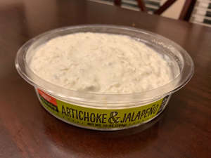 a bowl of food: Trader Joe's artichoke-and-jalapeño dip was subtly sweet. Savanna Swain-Wilson for Insider