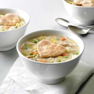 a bowl of food on a table: Chicken potpie soup
