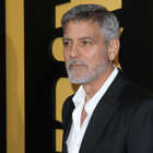 George Clooney wearing a suit and tie